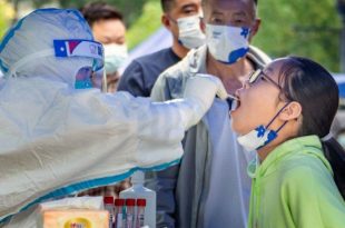 China: COVID-19 cases reach new record