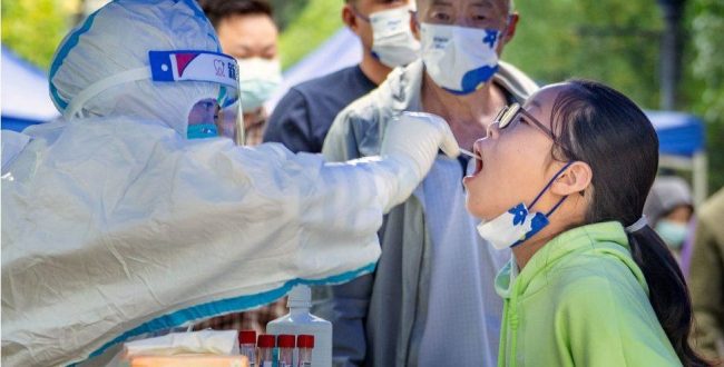 China: COVID-19 cases reach new record