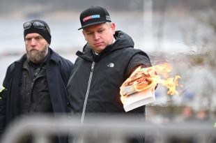 Swedish government condemns burning of Koran during protest