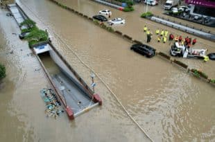 At least two dead in floods in Beijing