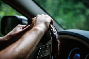 Taxi driver runs over police officer