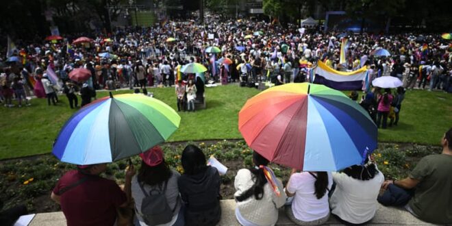 More than 100 same-sex couples marry in collective ceremony